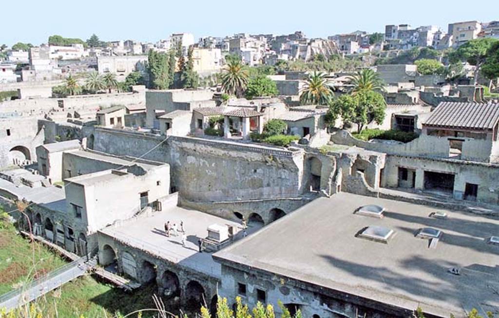 Herculaneum, October 2001. Looking north-west from the roadway above Suburban Baths, on right. On the left is the Sacred Area with the Terrace of Balbus, lower centre. Photo courtesy of Peter Woods.